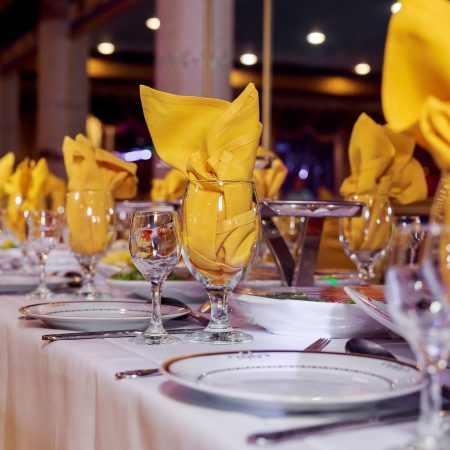 Beautifully decorated catering banquet table with different food snacks and appetizers with sandwich