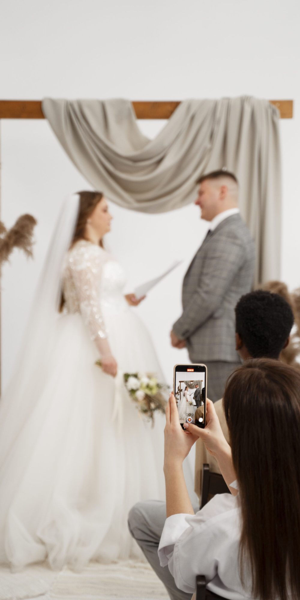 Bride and groom exchanging vows wedding ceremony