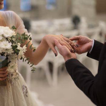 Bride and groom exchanging vows during the wedding reception