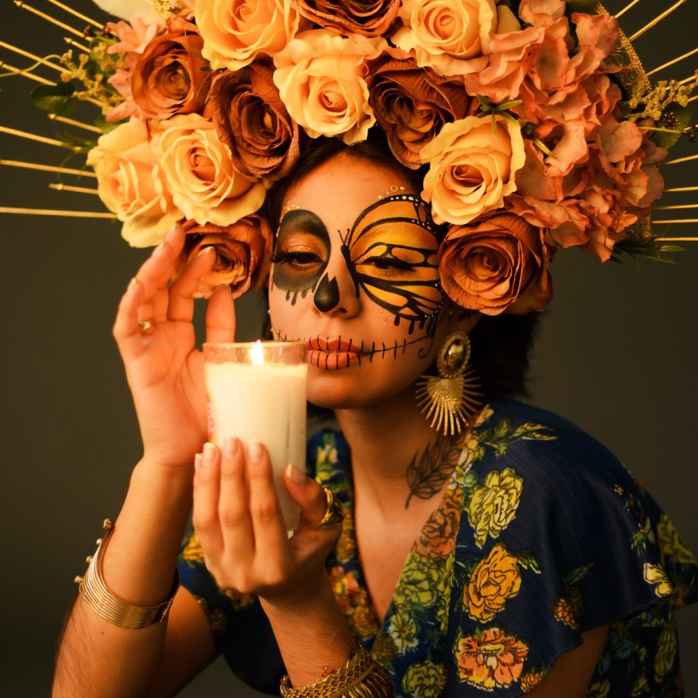 Portrait of a woman with sugar skull makeup. Halloween and day of the dead makeup.